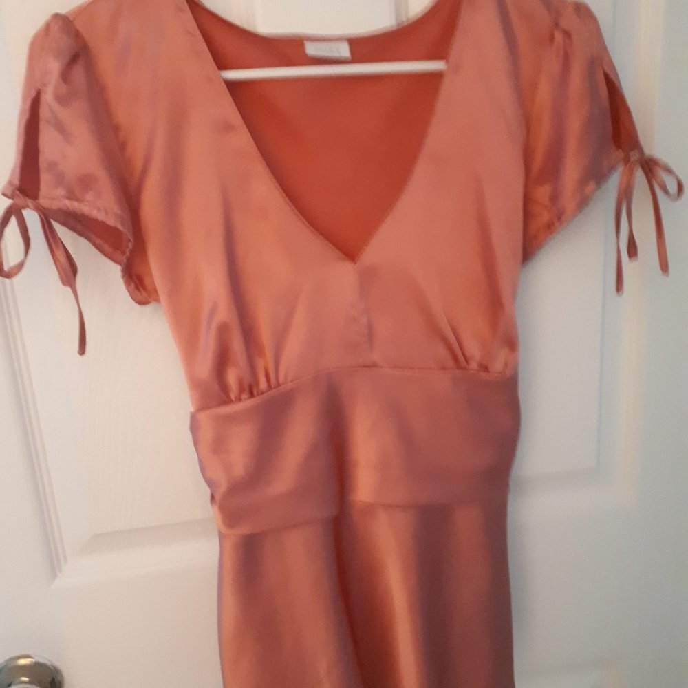 Suzy Shier Size small statement short-sleeved blouse
